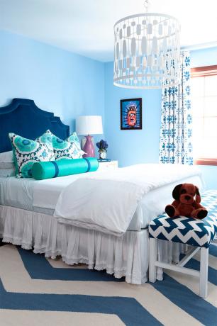 Foto van een slaapkamer in blauwe tinten