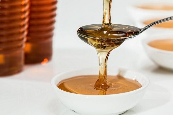 Koken honing oplossing. Illustratie voor een artikel gebruikte open source